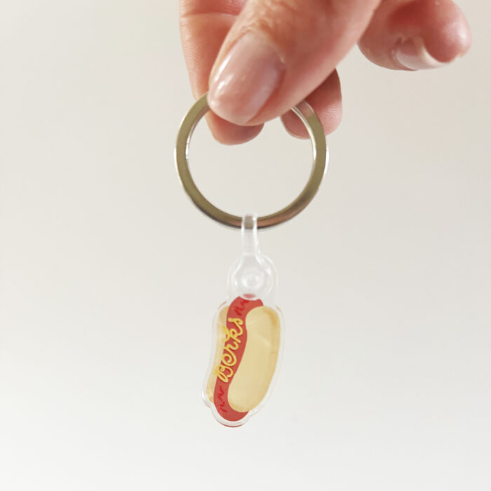 Berks Hot Dog Acrylic Keychain in hand