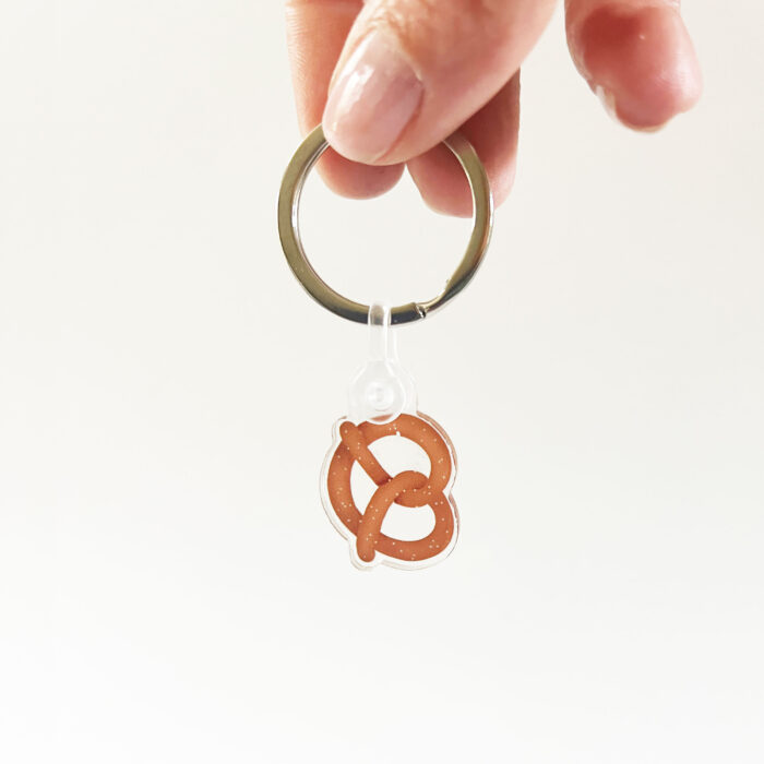 Pretzel Acrylic Keychain in hand