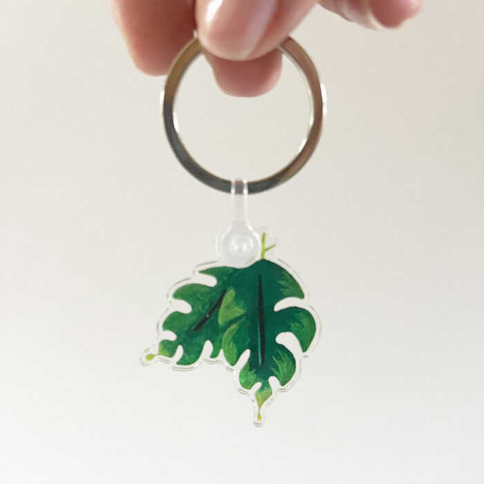 Tropical Leaf Acrylic Keychain in hand