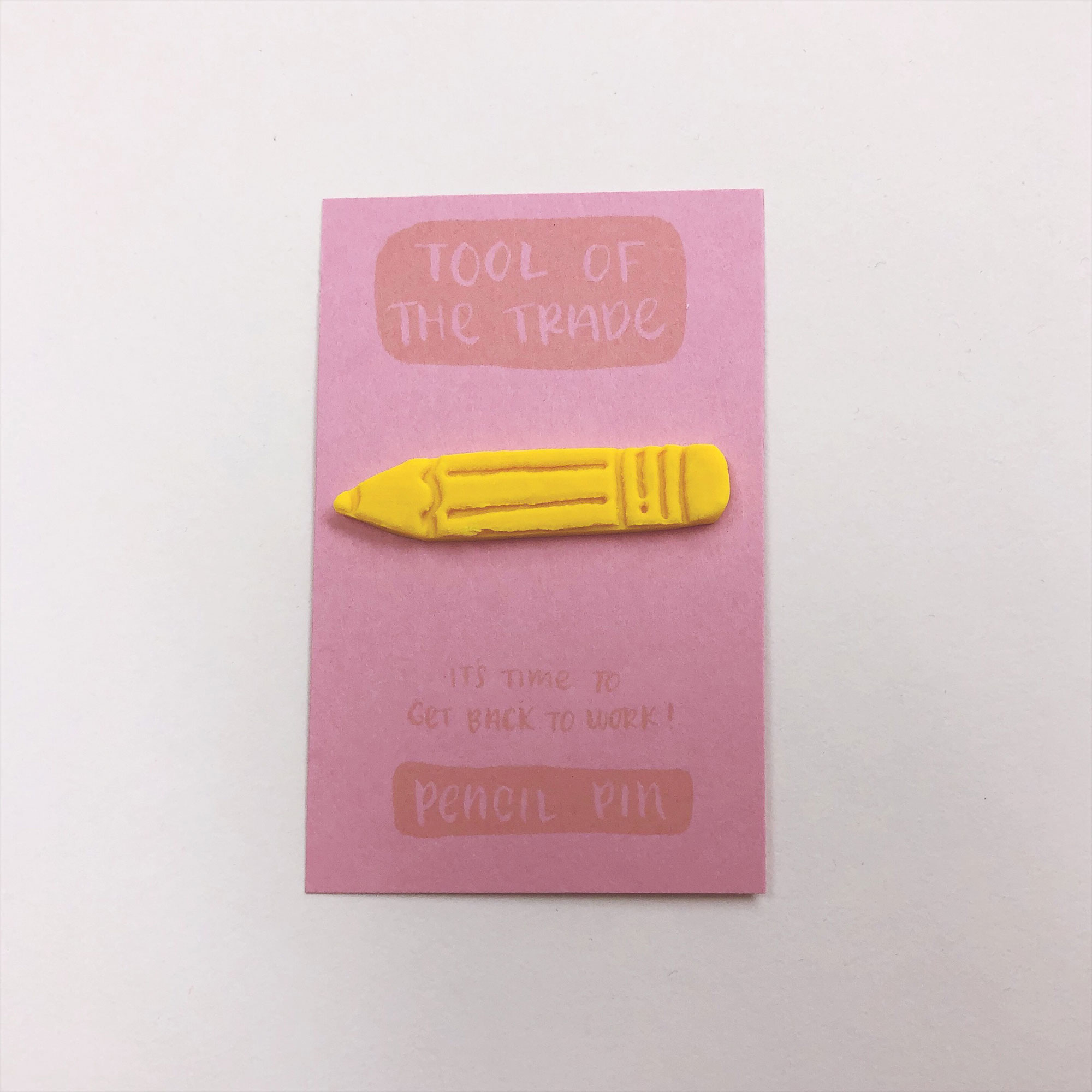 Yellow Pencil Pin on backer card