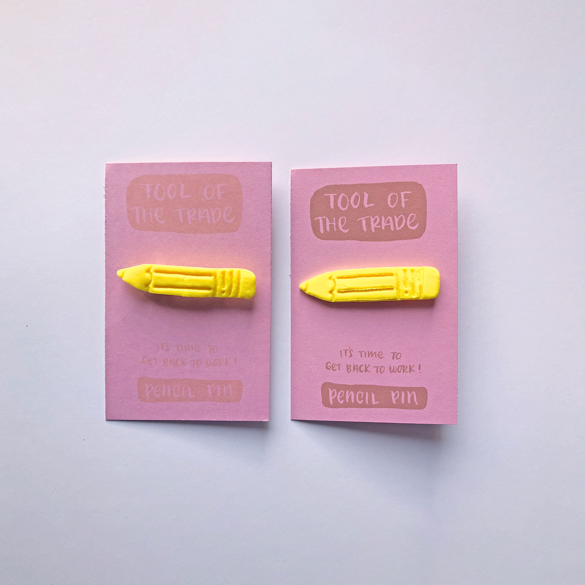 Yellow Pencil Pin on backer cards
