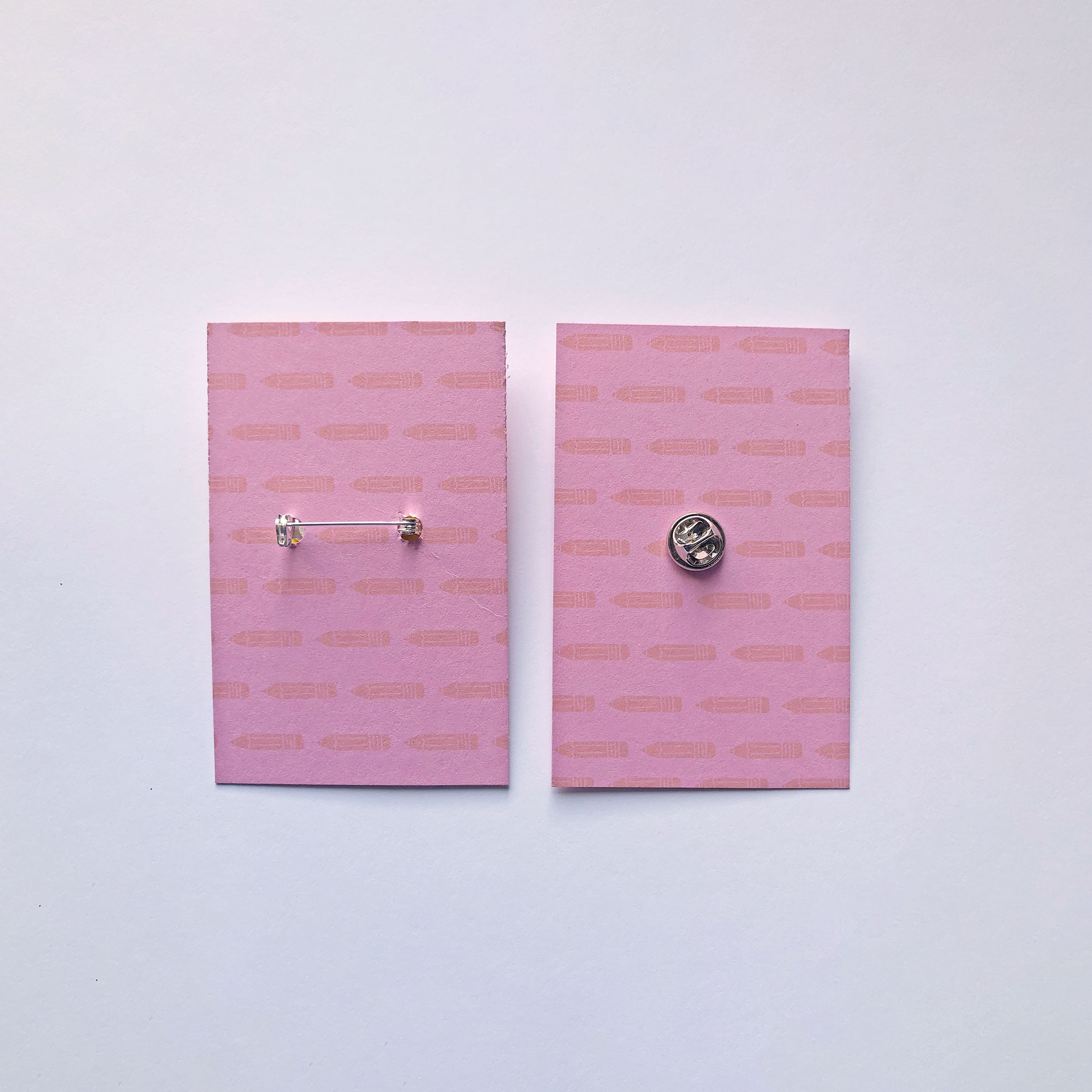 Yellow Pencil Pin on backer card, back